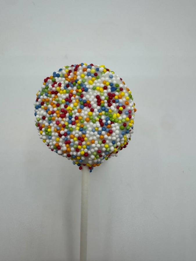 Dot cake pop — rainbow sprinkles